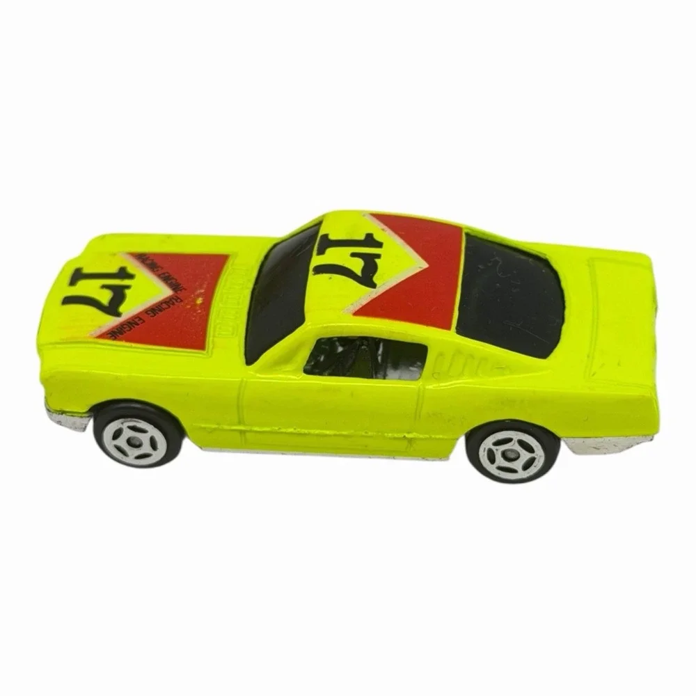 Vintage Yellow Diecast Toy Car with Racing Decals‎